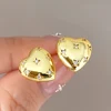 Pendientes de botón de oro