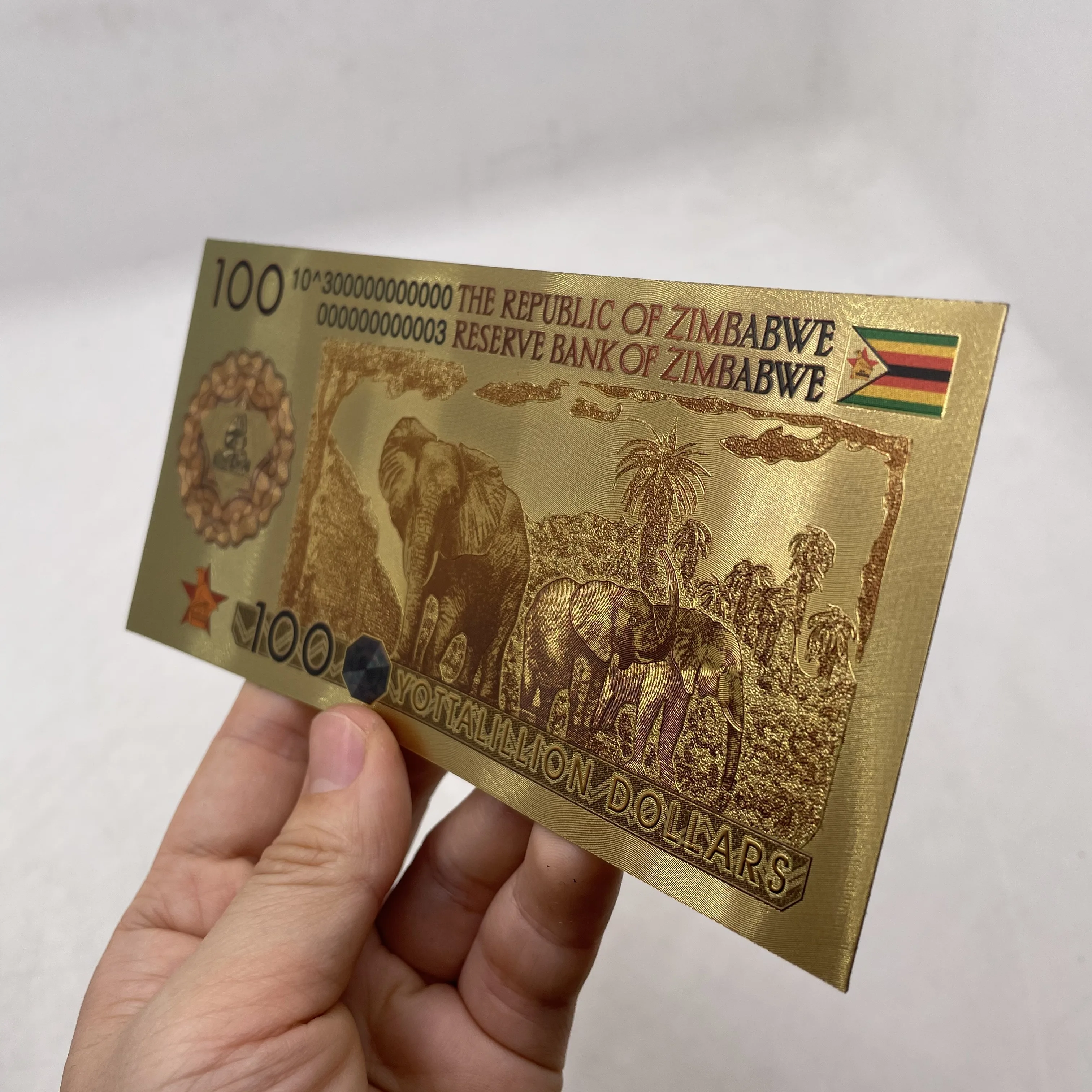 津巴布韦黄金钞票100亿美元津巴布韦更多零美元大象钞票用于收集礼物| Alibaba.com