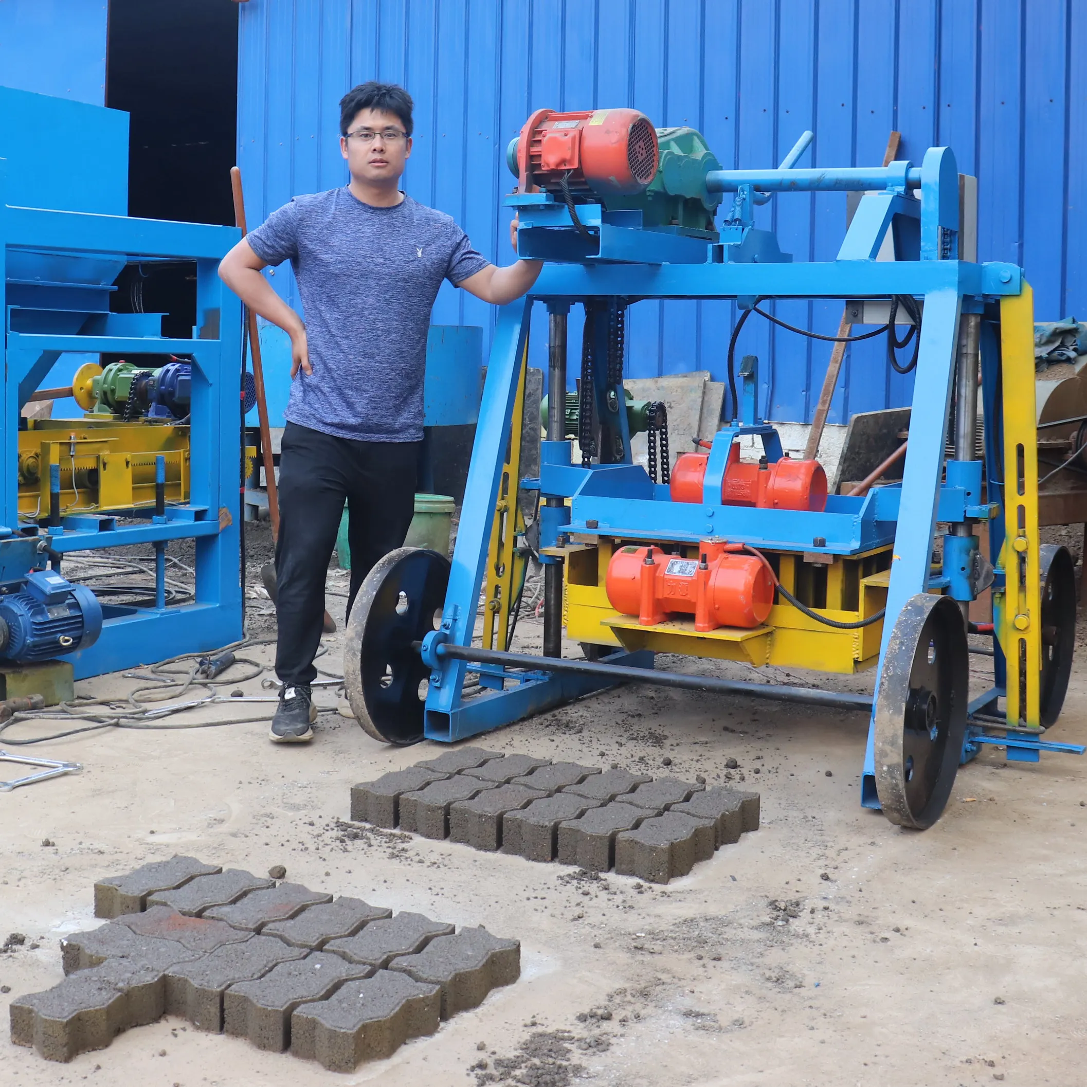 Большие колеса африканская Qtj4-40 мобильные гидравлические кирпичные брусчатки автоматические полые блоки машина для производства цемента цена