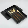Set da quattro pezzi in oro (con confezione regalo)