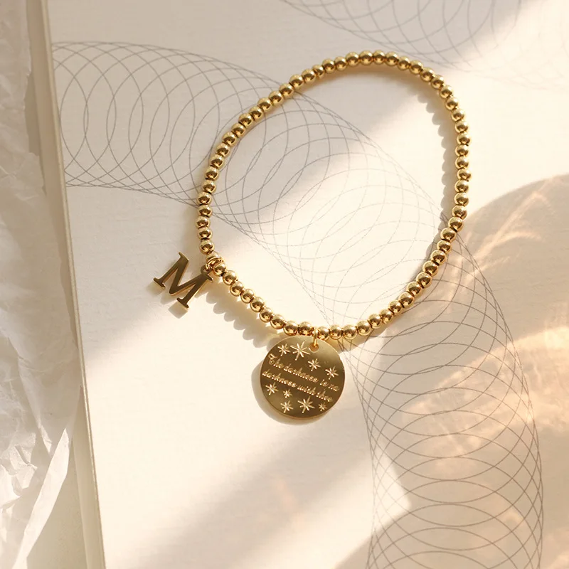 Wholesale INS Latest Design Golden Titanium Bead Chain Letter M Medallion  Pendant Bracelet Classic Elastic Ball Chain Star Coin Bracelet From m .