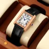Rose gold case with black strap