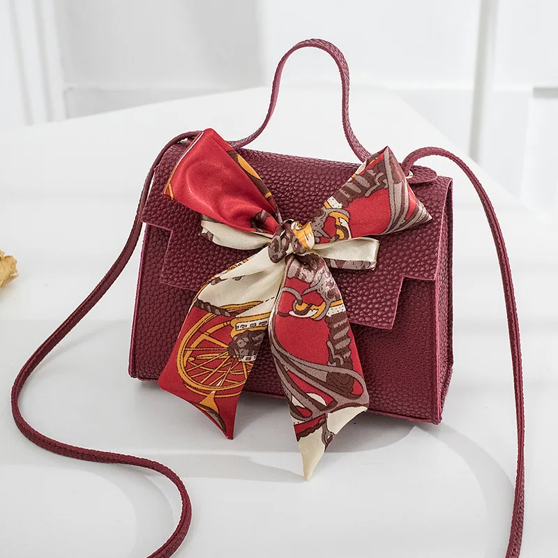 red lily bolsa