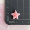 3 mini estrellas de mar de lunares rosas
