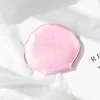 Laser-etched shell makeup mirror-pink with fish-scale pattern