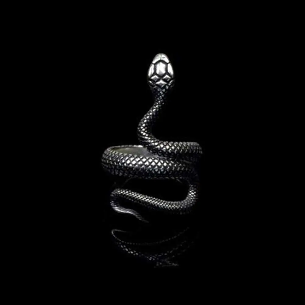 Змея на заставку телефона. Змеи на черном фоне. Черная змея. Кобра на темном фоне. Черная Кобра.