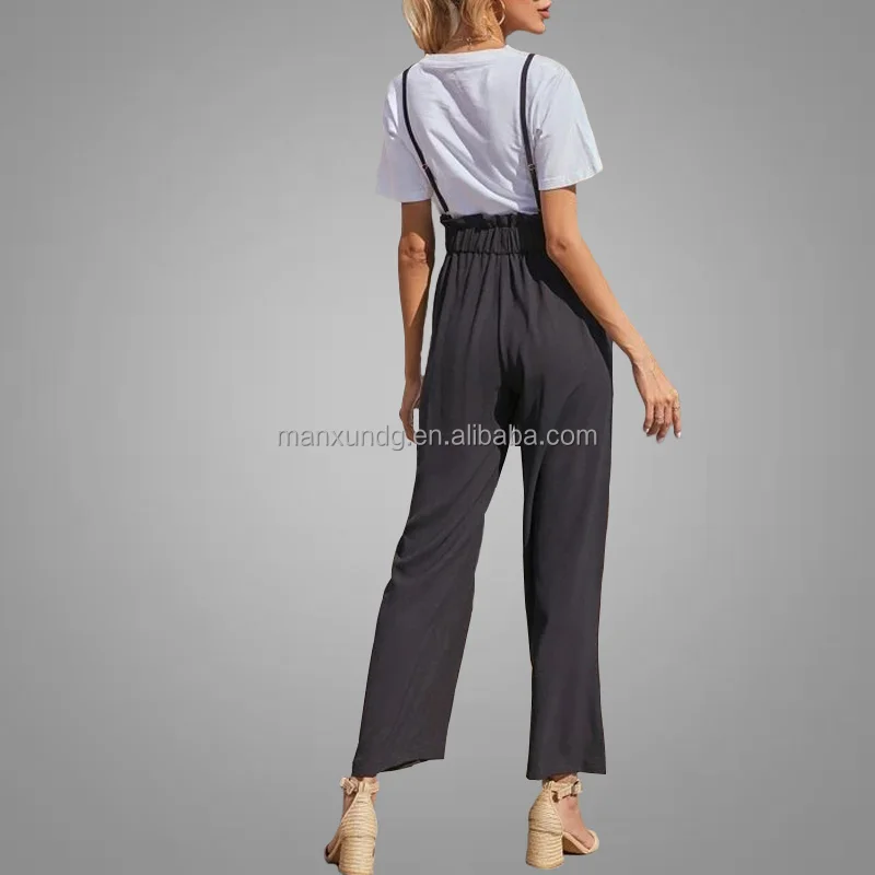 White shirt and black trousers with suspenders Female mannequin dressed in  blouse and capri with braces Stock Photo  Adobe Stock