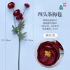 Capullos de rosa de té de cuatro cabezas, rojo vino