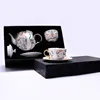 Crane & Blossom - Ceramic Teapot + 2 Cups & Saucers