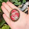 Broche rojo