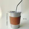 Titanium purification cup with Ti label, brush, straw, and cup sleeve