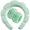 Two green wrists
