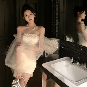 Strapless Bodycon Dress with Tulle Puff Sleeves and a Sparkling Embellished Neckline Creates a Dreamy and Elegant