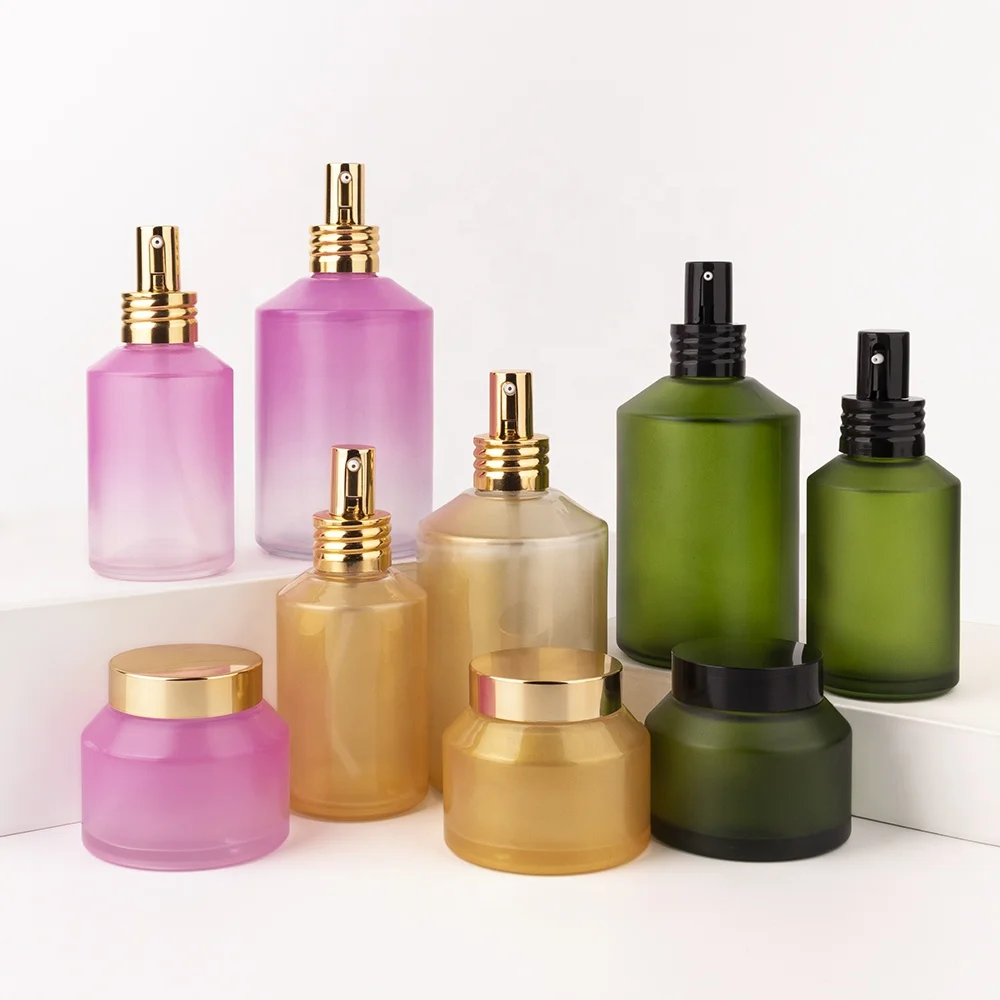 cosmetic packaging slanted shoulder pink olive green frosted glass bottle gold lid cream jar sets bottles