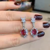 Red glass ear studs