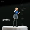 Girl with makeup mirror-blue clothes
