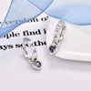 Silver plated purple stone earrings