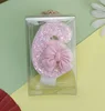 Candela numero 6 con fiocco rosa