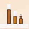 Matte amber bottle + Steel roller ball + Plastic white cap