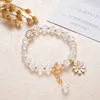 Bracciale margherita con perline di popcorn bianche