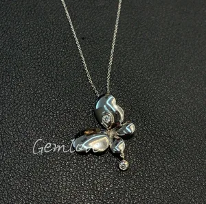 18K gold lab-grown diamond butterfly necklace, featuring round and pear-shaped cuts, a perfect jewelry gift for women