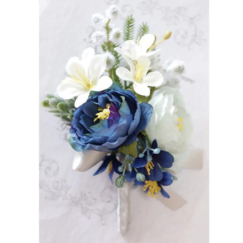 white roses blue ribbon wrist corsage