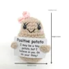 Beige bow eyelash potato