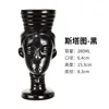 Witch statue black