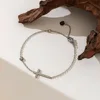 Cruz Brazalete Acero