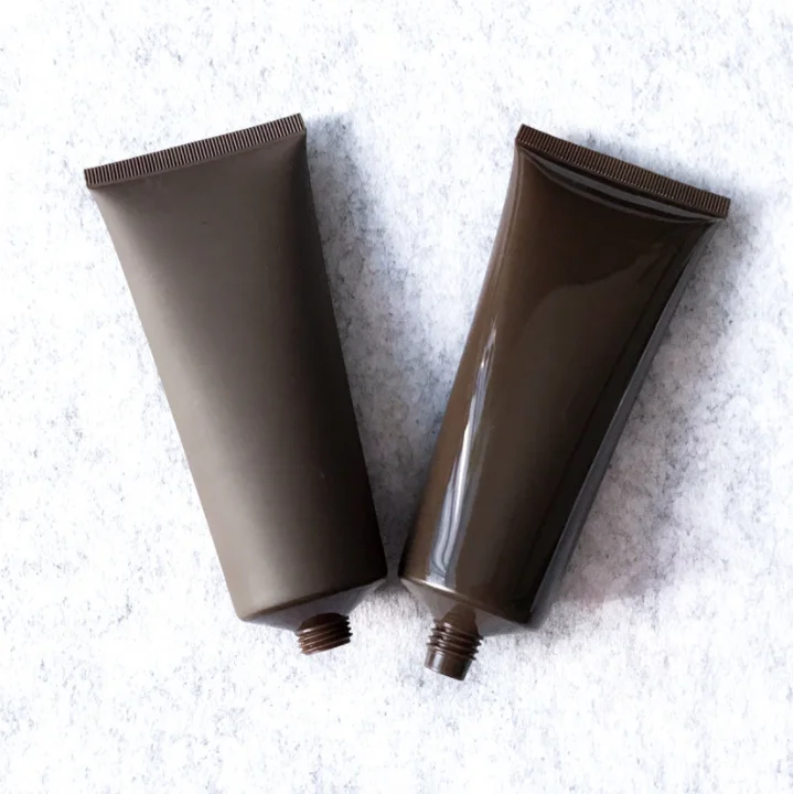 50ml 100ml 150ml PE Plastic Matt Shiny Brown Matt Brown White Cream Soft Tube Cleanser Tube Hand Lotion Tube with Black Flip Lid