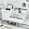 Three ivory white desktop cosmetic storage boxes