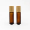 Amber frosted bottle with fake bamboo lid