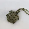 Montre collier style tortue couleur bronze