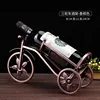 Champagne stopper tricycle