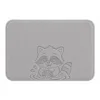 Raccoon washes hands