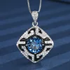 Blue pointed crystal pendant with box chain