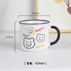 Blue handle with smiley bear face