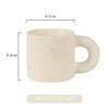 Cream-colored chubby cup