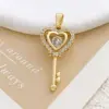 Ciondolo chiave a forma di cuore Xl151 in oro