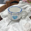 Tazza con griglia a forma di cuore blu, 300ml