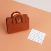 Brown bag + sheet music