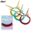 Bracciale in corda intrecciata con ciondolo