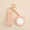 Pink round mirror