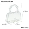 Handbag with transparent leather stopper