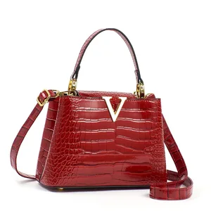 Guangzhou eco female bags custom logo printed faux leather casual shoulder crossbody bag latest women's handbags 2026