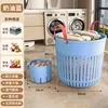 One large and one small laundry basket in cream blue