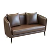 brown double seat sofa