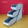 Gray three-compartment combination shelf