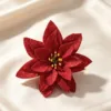 Flores navideñas con purpurina roja