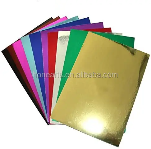 colorful metallic paper sheets grey back